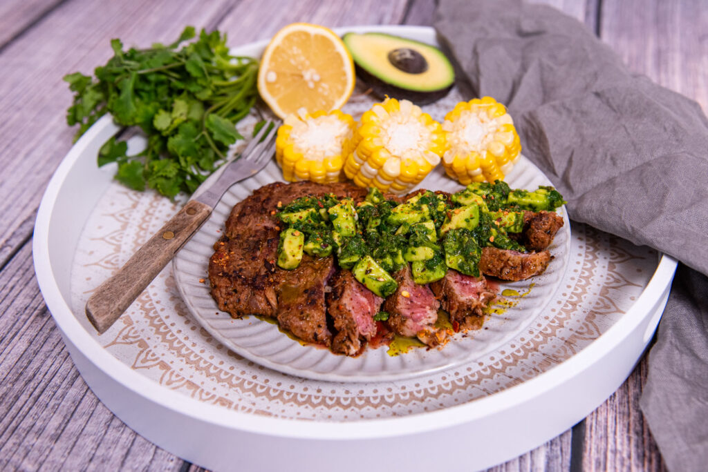 Avocado oil marinated steak with avocado chimichurri
